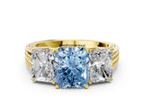 Yellow gold Fancy Blue Radiant Cut Diamond Three-Stone Ring with Prong Setting and Textured Band