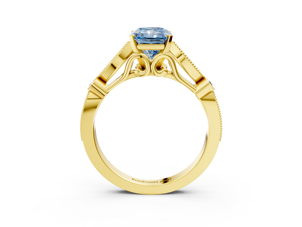 Yellow gold Fancy Blue Radiant  Cut Diamond with Milgrain Marquise and Bezel Accents on a Solitaire Band with Prong Setting