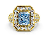 Yellow gold Fancy Blue Radiant Cut Halo Diamond Engagement Ring with Pave Split Shank and Four-Prong Setting