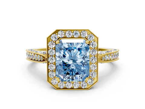 Yellow gold Fancy Blue Radiant Cut Halo Diamond Engagement Ring with Split Shank Band and Four-Prong Setting
