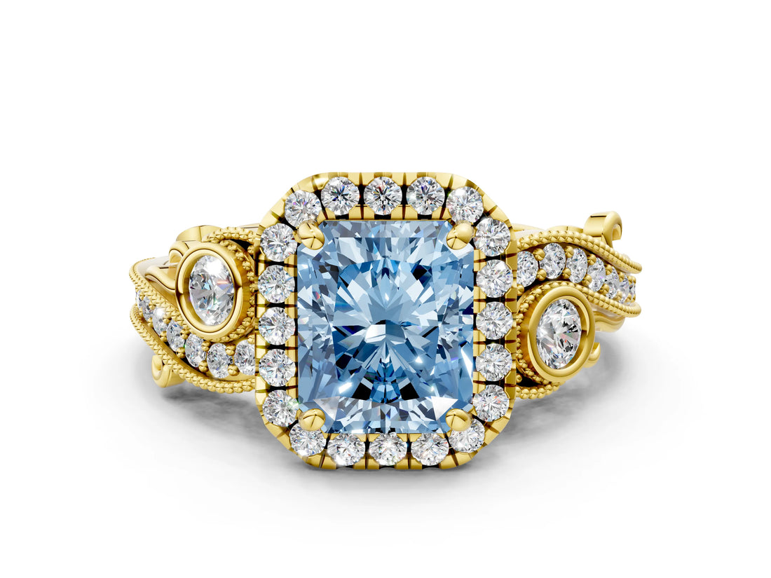 Yellow gold Fancy Blue Radiant Cut Halo Diamond Ring with Milgrain and Bezel Accents on a Split Shank Band_12