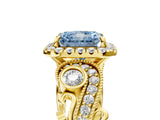 Yellow gold Fancy Blue Radiant Cut Halo Diamond Ring with Milgrain and Bezel Accents on a Split Shank Band_17