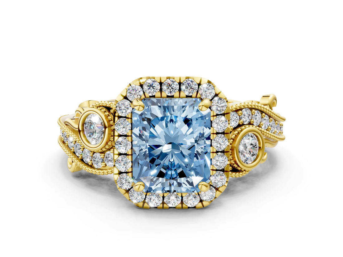Yellow gold Fancy Blue Radiant Cut Halo Diamond Ring with Milgrain and Bezel Accents on a Split Shank Band_24