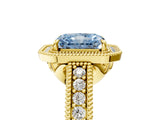 Yellow gold Fancy Blue Radiant  Cut Halo Diamond Ring with Pavé Band and Four-Prong Setting_80