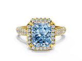 Yellow gold Fancy Blue Radiant Cut Halo Diamond Ring with Pavé Band