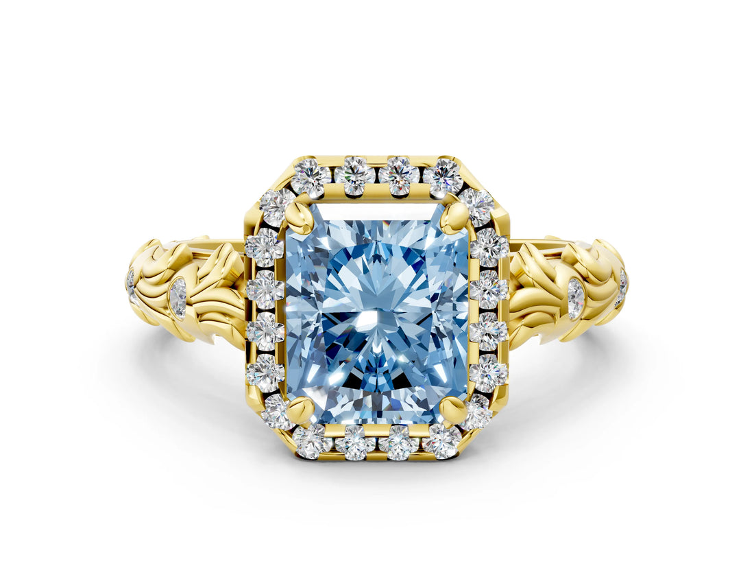 Yellow gold Fancy Blue Radiant Cut Halo Diamond Solitaire with Filigree Band and Four-Prong Setting