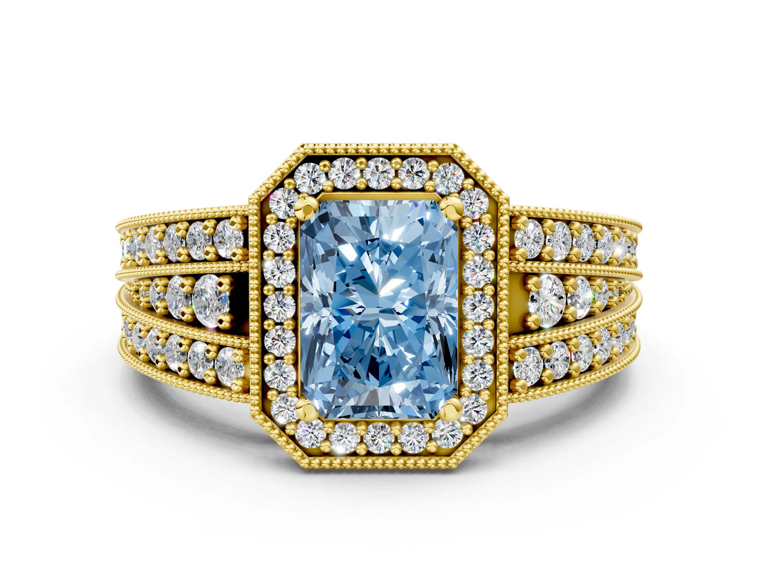 Yellow gold Fancy Blue Radiant Cut Halo Diamond Split Shank Ring with Prong Setting