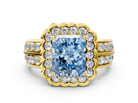 Yellow gold Fancy Blue Radiant Cut Halo Diamond Split Shank Ring with Scalloped Prong Setting