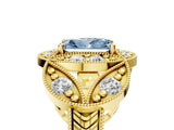 Yellow gold Fancy Blue Radiant Cut Halo Milgrain Diamond Engagement Ring with Leaf Band and Four-Prong Setting_5