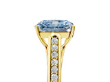 Yellow gold Fancy Blue Radiant Cut Solitaire Cathedral Diamond Engagement Ring with Channel-Set Band and Four-Prong Setting_8
