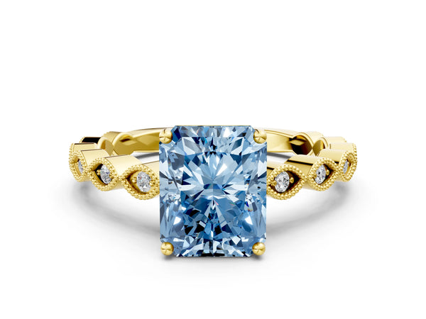 Yellow gold Fancy Blue Radiant Cut Solitaire Diamond Ring with Infinity Twist Band and Four-Prong Setting