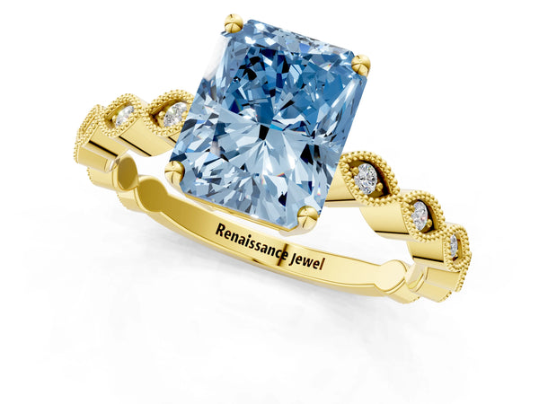 Yellow gold Fancy Blue Radiant Cut Solitaire Diamond Ring with Infinity Twist Band and Four-Prong Setting