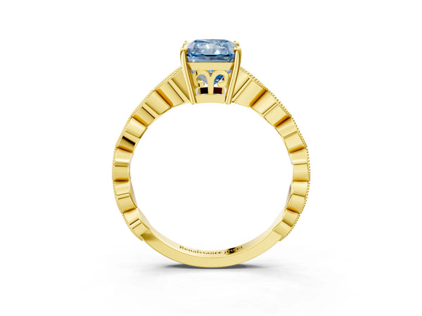Yellow gold Fancy Blue Radiant Cut Solitaire Diamond Ring with Infinity Twist Band and Four-Prong Setting