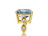 Yellow gold Fancy Blue Radiant Cut Solitaire Diamond Ring with Infinity Twist Band and Four-Prong Setting_17