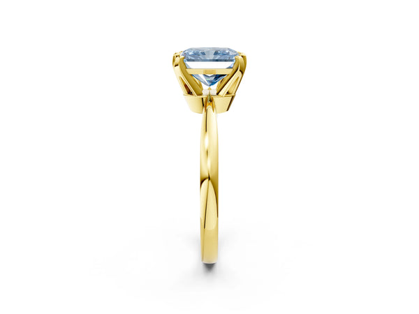 Yellow gold Fancy Blue Radiant Cut Solitaire Engagement Ring with Six-Prong Setting and Tapered Band