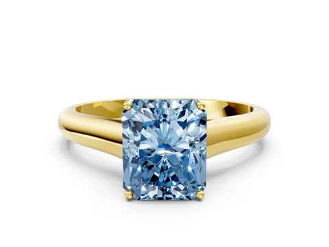 Yellow gold Fancy Blue Radiant Cut Solitaire Engagement Ring with Tapered Band and Four-Prong Setting_3
