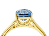 Yellow gold Fancy Blue Radiant Cut Solitaire Engagement Ring with Tapered Band and Four-Prong Setting_7