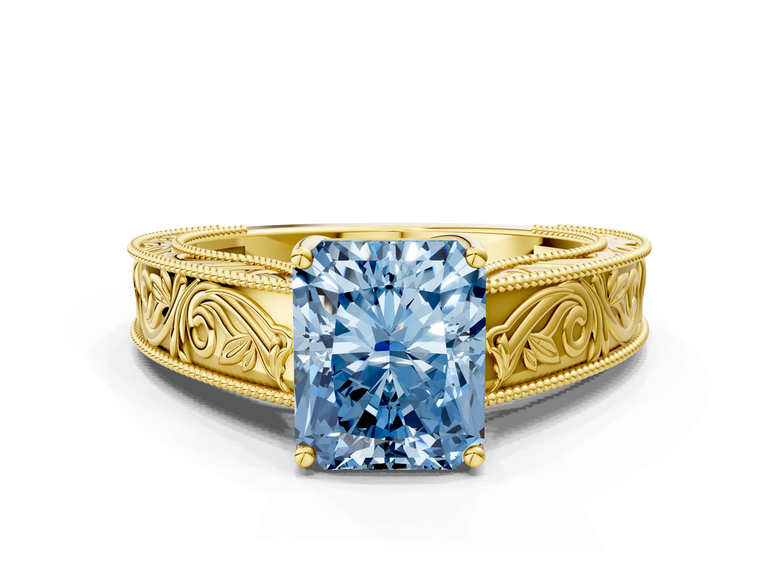 Yellow gold Fancy Blue Radiant  Cut Solitaire Engraved Band with Four-Prong Setting_113