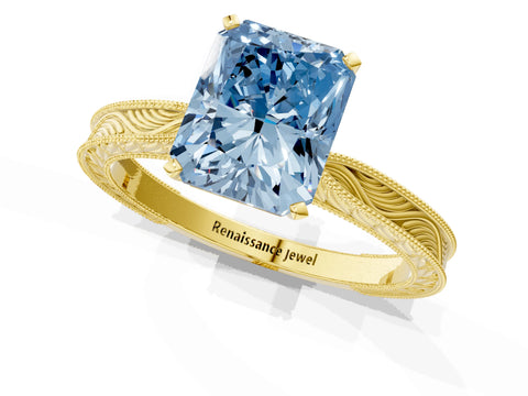Yellow gold Fancy Blue Radiant Cut Solitaire Milgrain Engraved Band with Four-Prong Setting_1