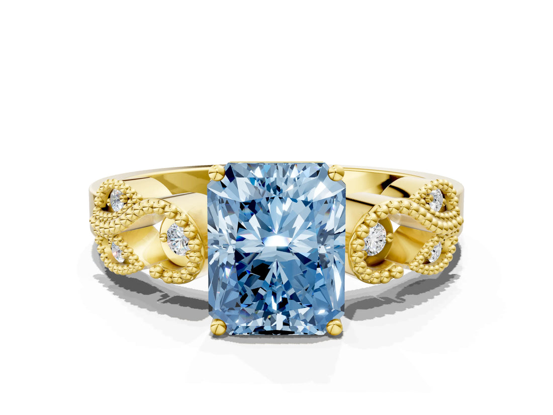 Yellow gold Fancy Blue Radiant Cut Solitaire Milgrain Leaf Band with Prong Setting