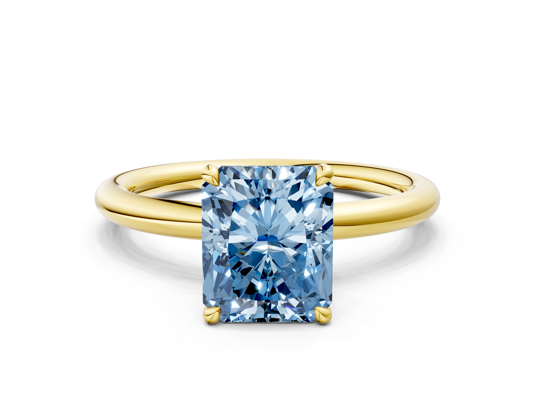 Yellow gold Fancy Blue Radiant  Cut Solitaire Ring with Thin Band and Four-Prong Setting_16