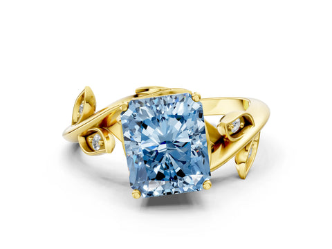 Yellow gold Fancy Blue Radiant Cut Solitaire Twist Engagement Ring with Leaf Accents and Prong Setting_13