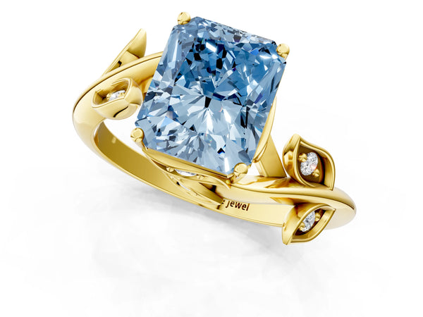 Yellow gold Fancy Blue Radiant Cut Solitaire Twist Engagement Ring with Leaf Accents and Prong Setting