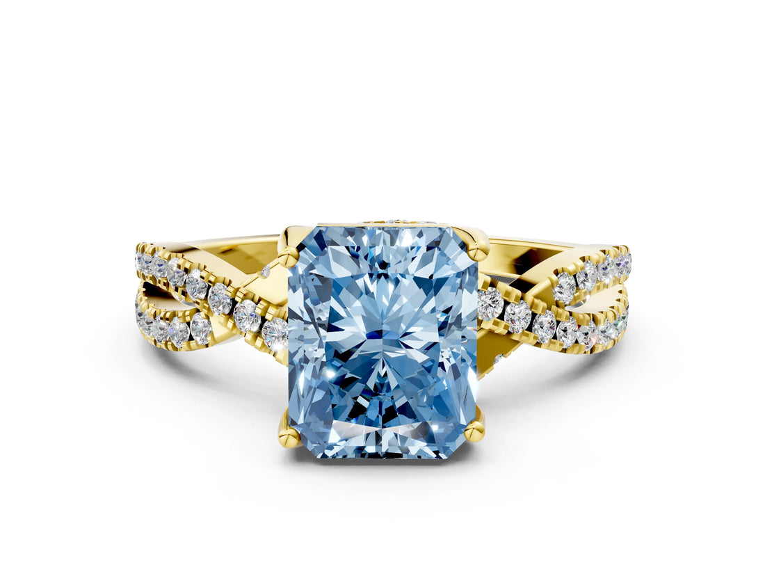 Yellow gold Fancy Blue Radiant Cut Solitaire Twist Pave Diamond Engagement Ring with Prong Setting