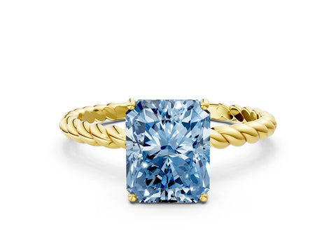 Yellow gold Fancy Blue Radiant Cut Solitaire Twisted Band 4-Prong Ring
