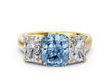 Yellow gold Fancy Blue Radiant Cut Three-Stone Diamond Ring with Prong Setting on a Classic Band_12