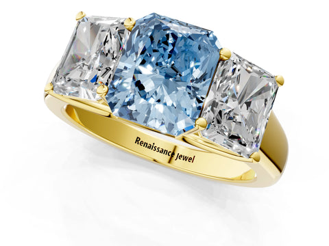Yellow gold Fancy Blue Radiant Cut Three-Stone Diamond Ring with Prong Setting on a Classic Band_1
