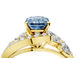 Yellow gold Fancy Blue Radiant  Diamond Halo Ring with Marquise and Pavé Band in Prong Setting_55