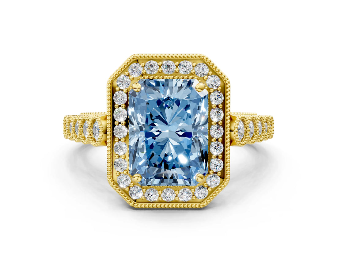 Yellow gold Fancy Blue Radiant  Halo Milgrain Solitaire with Bezel Set Side Stones and Pave Band_32