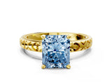 Yellow gold Fancy Blue Radiant  Solitaire Diamond Engagement Ring with XO Engraved Band and Four-Prong Setting 1