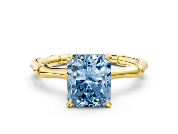 Yellow gold Fancy Blue Radiant  Solitaire Diamond Ring with Bamboo Band and Four-Prong Setting