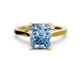 Yellow gold Fancy Blue Radiant  Solitaire Diamond Ring with Four-Prong Setting and Tapered Band