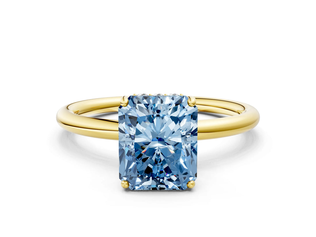 Yellow gold Fancy Blue Radiant  Solitaire Diamond Ring with a Classic Band and Four-Prong Setting 1