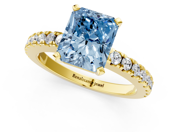 Yellow gold Fancy Blue Radiant Cut Solitaire Diamond with Pavé Band and Four-Prong Setting