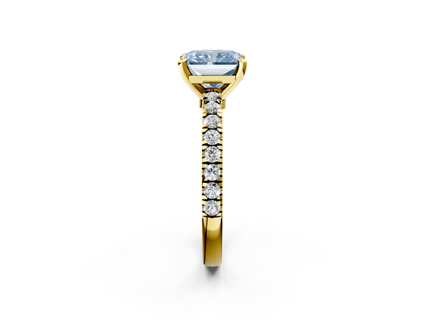 Yellow gold Fancy Blue Radiant Cut Solitaire Diamond with Pavé Band and Four-Prong Setting