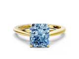 Yellow gold Fancy Blue Radiant  Solitaire Engagement Ring with Four-Prong Setting and Classic Band 1