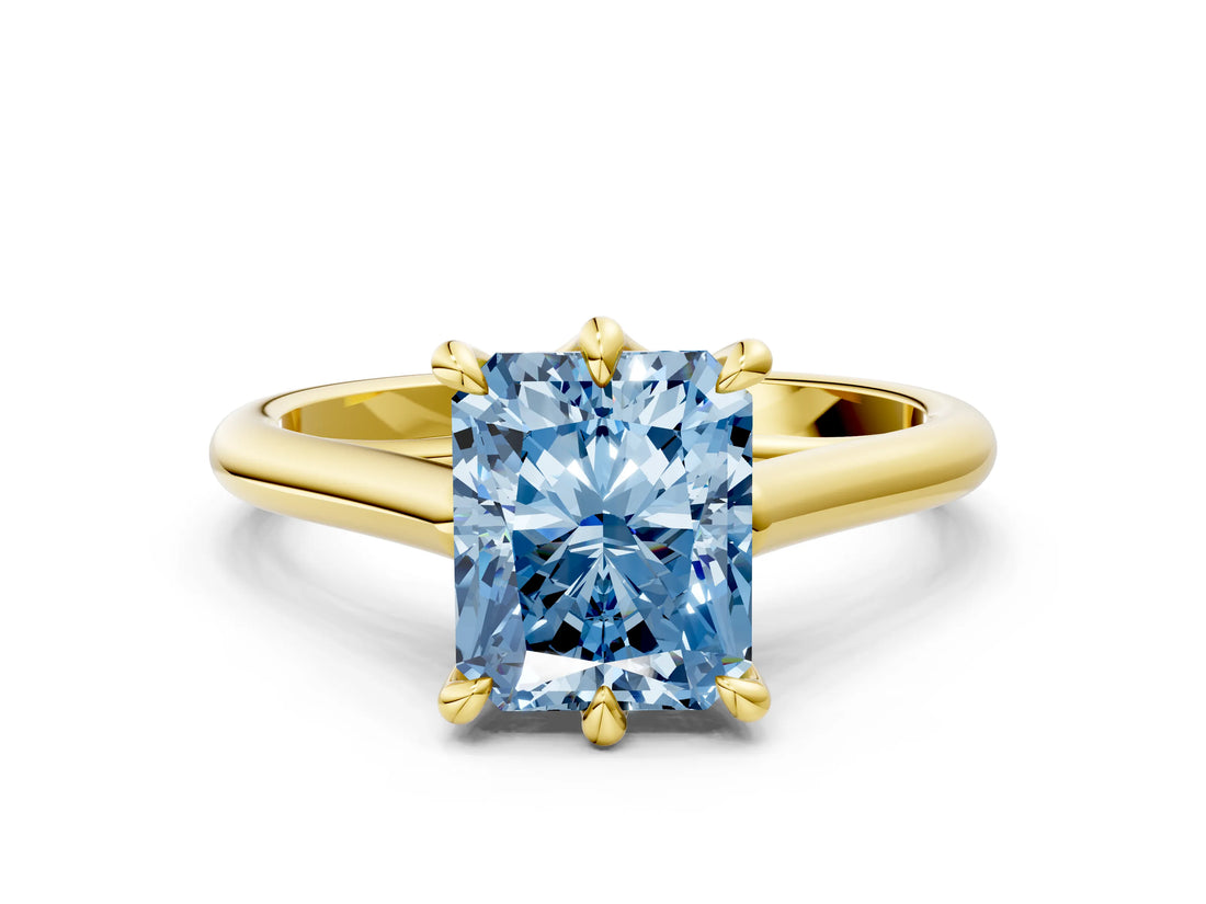 Yellow gold Fancy Blue Radiant  Solitaire Engagement Ring with Six-Prong Setting and Classic Band