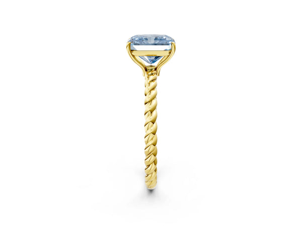 Yellow gold Fancy Blue Radiant  Solitaire Twist Band Ring with Four-Prong Setting