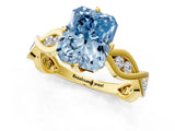 Yellow gold Fancy Blue Radiant  Solitaire Twist Band with Leaf Prong Setting 1