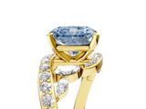 Yellow gold Fancy Blue Radiant  Solitaire with Pavé Twist Band and Four-Prong Setting_65