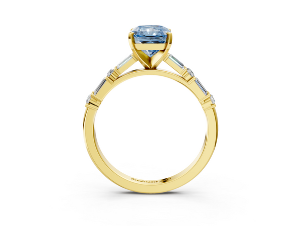 Yellow gold Fancy Blue Radiant Cut Diamond Solitaire with Side Baguettes and Channel Set Band