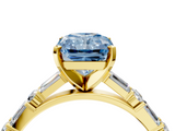 Yellow gold Fancy Blue Radiant  Solitaire with Side Baguettes and Channel Set Band_66