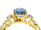 Yellow gold Fancy Blue Radiant  Three-Stone Diamond Ring with Pavé Split Shank and Four-Prong Setting_75