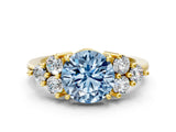 Yellow gold Fancy Blue Round Cut Brilliant Diamond Cluster Accent Solitaire Ring with Prong Setting