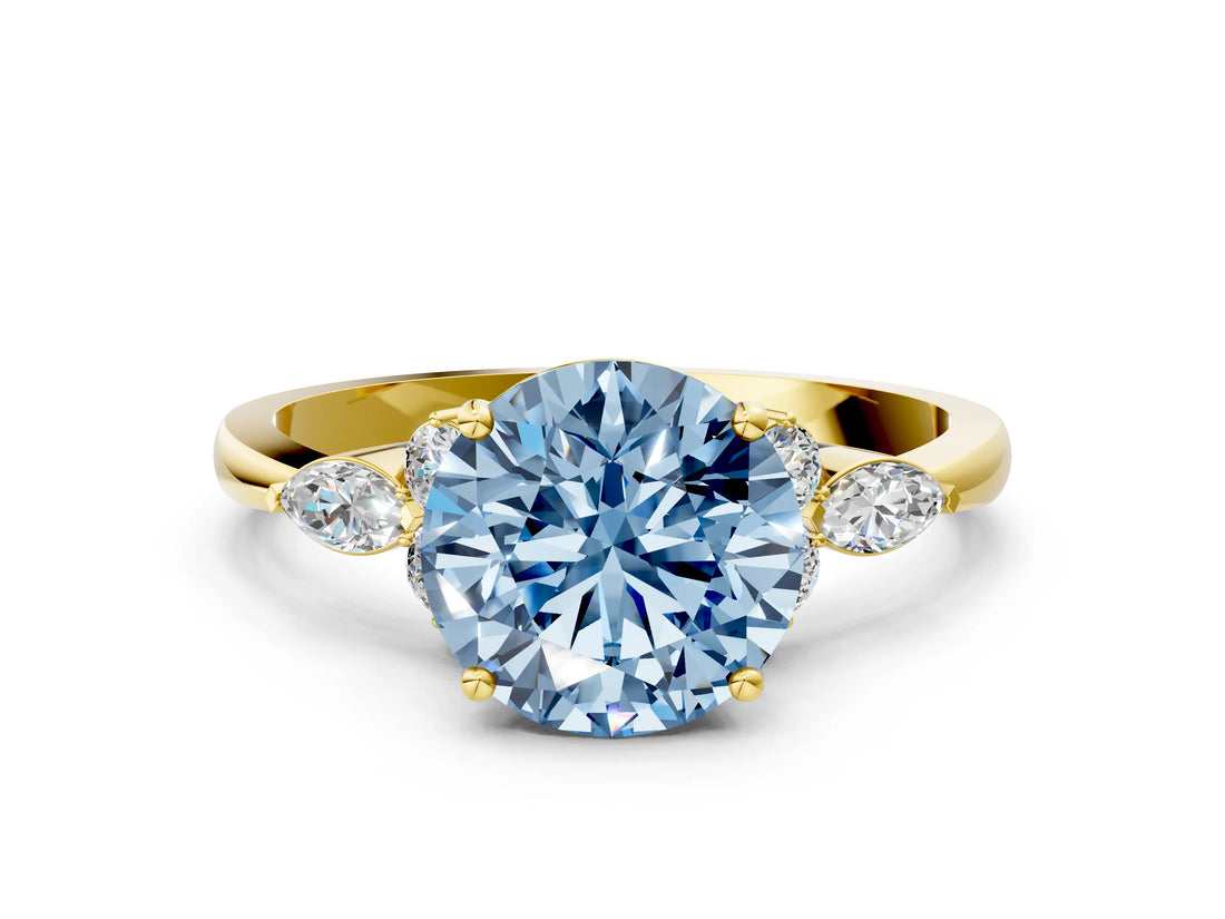 Yellow gold Fancy Blue Round Cut Brilliant Diamond Solitaire Ring with Pear Side Stones and Four-Prong Setting_3
