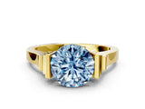 Yellow gold Fancy Blue Round Cut Brilliant Solitaire Diamond Ring with Channel Set Band and Bar Prong Setting